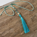 turquoise green buddha tassel necklace
