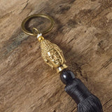 black buddha brass key ring bag tassel