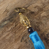 turquoise buddha bag tassel key ring 