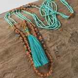 teal green buddha necklace
